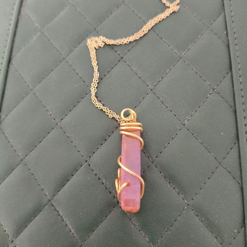 Necklace with pink stone pendant like new, faux gold