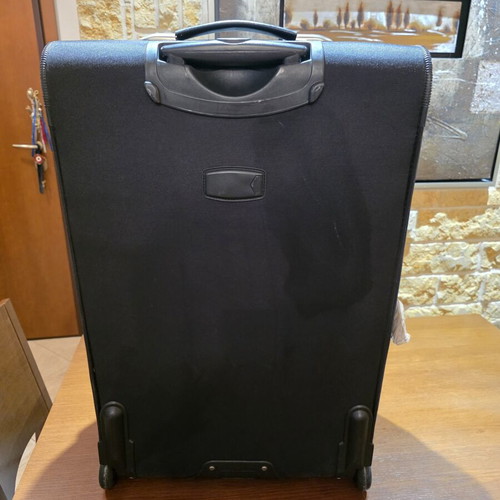 Carpisa 28" Travel Suitcase used, black semi-rigid fabric