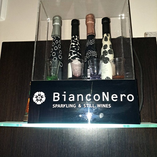 Bianco Nero champagne bottles in illuminated decorative display new