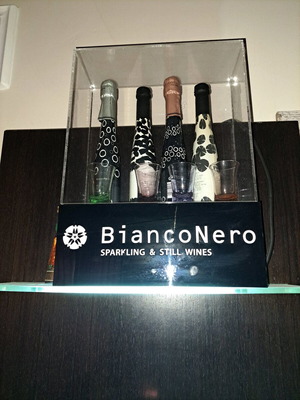 Bianco Nero champagne bottles in illuminated decorative display new