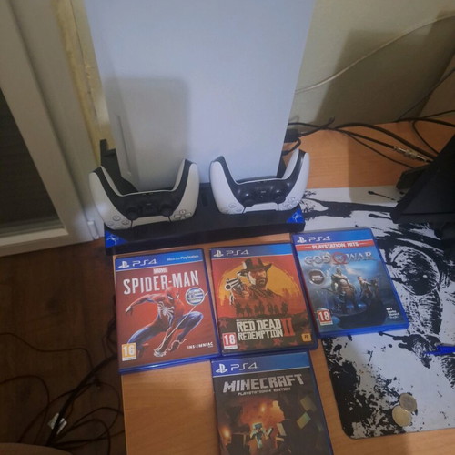 PS5 825GB Disc Edition with 2 controllers and charging cooling stand