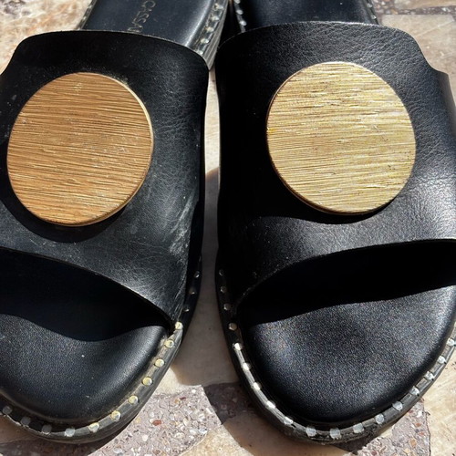 Women's flat sandals used, black with gold buckle, size 38