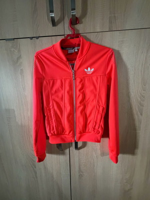 Adidas jacket orange like new, with fleece lining