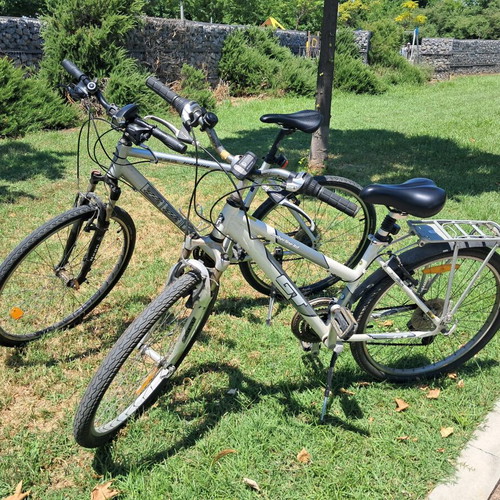 ZZK and GT Timberline Ltd trekking bicycles, silver, with gears