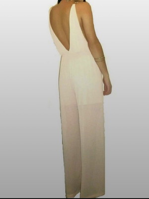 One-piece pink jumpsuit like new with open back and gold details