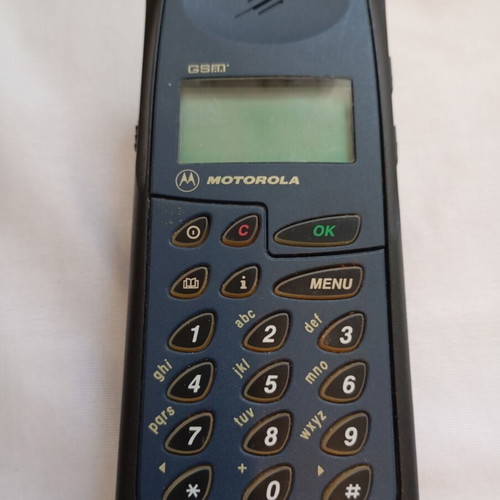 Motorola Flare GSM vintage mobile phone with charging base used