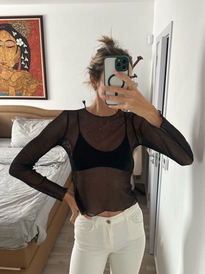 Zara blouse with long sleeves and holes like new, black