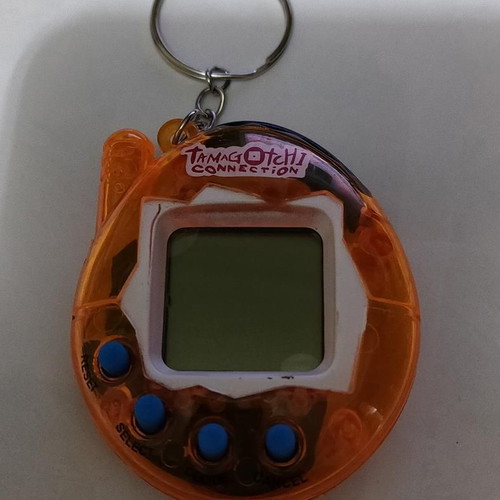 Tamagotchi Connection Orange Transparent like new