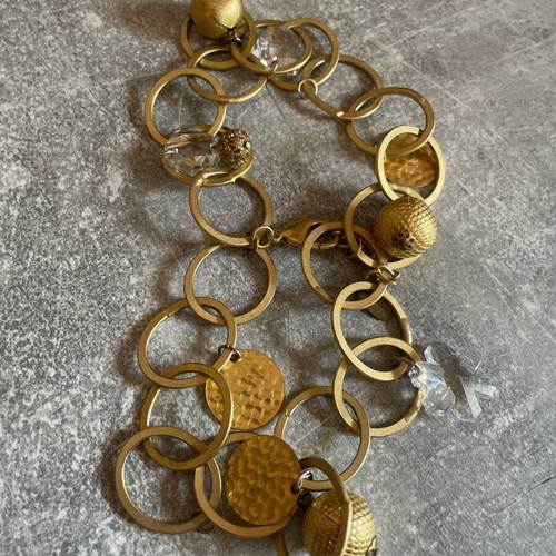Gold-colored bracelet like new with rings