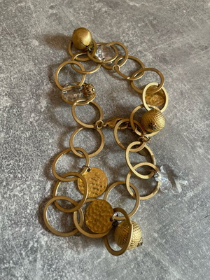 Gold-colored bracelet like new with rings