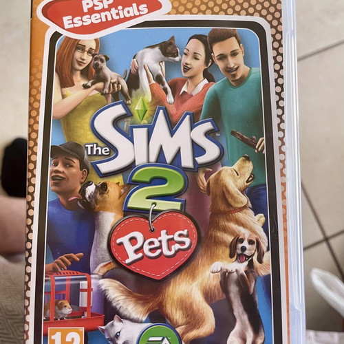The Sims 2 Pets PSP game like new with case and manual