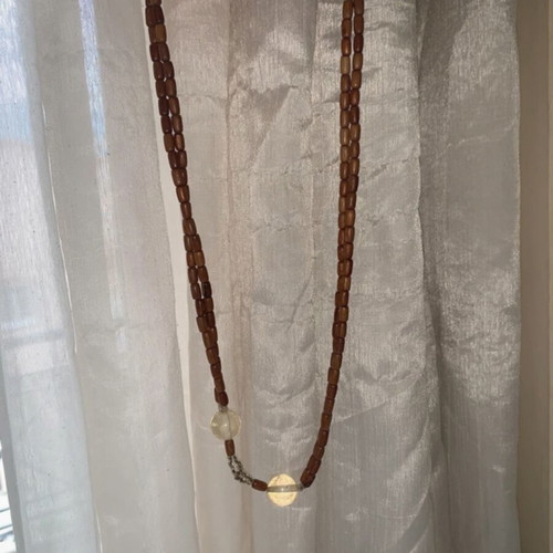 Set of 3 wooden necklaces, brown tones