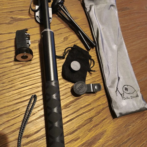 Selfie stick like new with two lenses, tripod base and Bluetooth bracelet