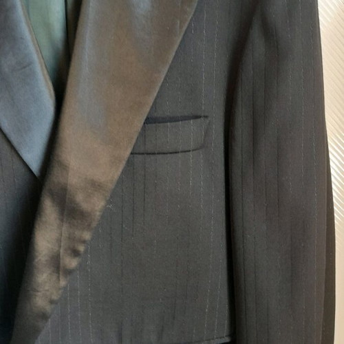 Woman's suit jacket used, black with satin parts, size M