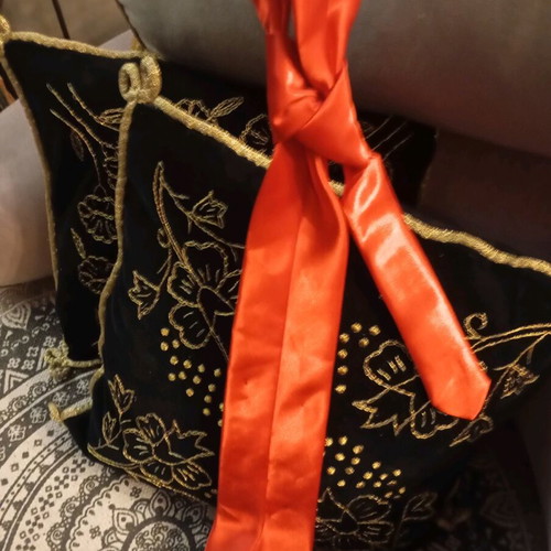 Red tie like new with pearls