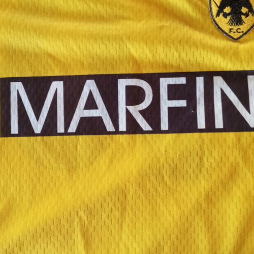 AEK kids football jersey #10 Tsartas, size 8Y