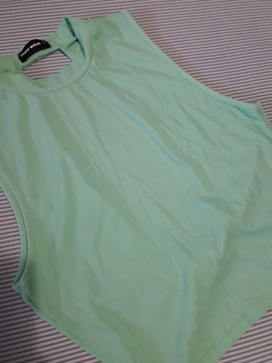Top ribbed elastic with open back like new