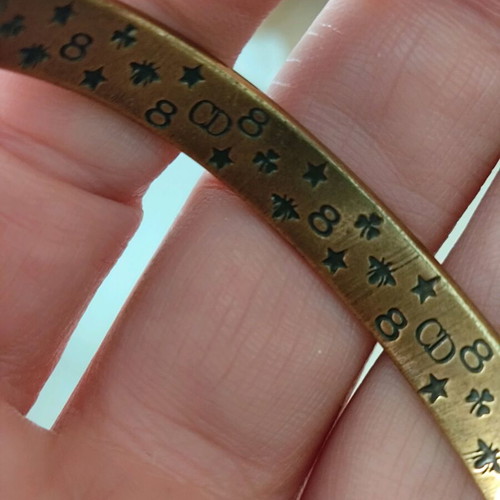 Christian Dior brass cuff bracelet like new, gold tone