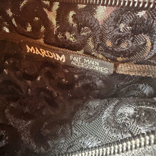 Mardium black handmade handbag used, spacious with swirling details