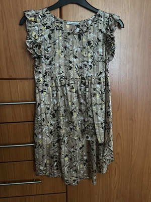 Regalinas asymmetric blouse with transparent fabric
