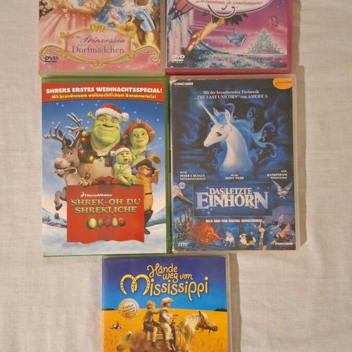 Children's DVDs genuine in German language, like new, pack of 5