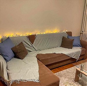 Γωνιακός καναπές-κρεβάτι με αποθηκευτικό χώρο