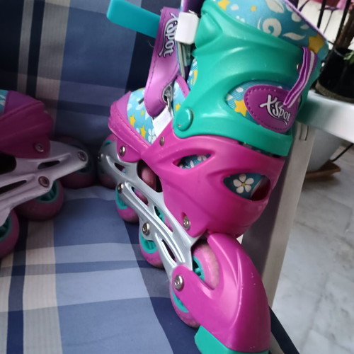 Xspot Kids Roller Skates size 31-33, like new, colorful