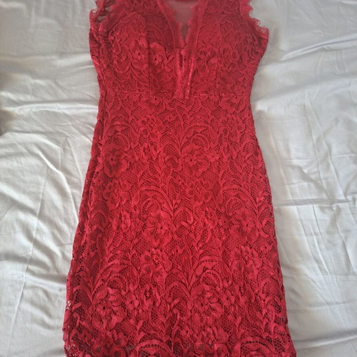 Red embroidered dress with chest transparency and open back, like new
