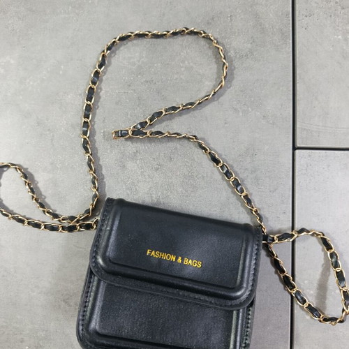 Small black crossbody bag with gold chain like new