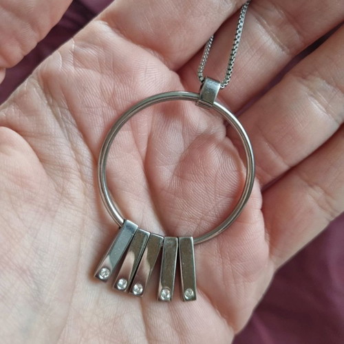 Steel necklace with stones like new