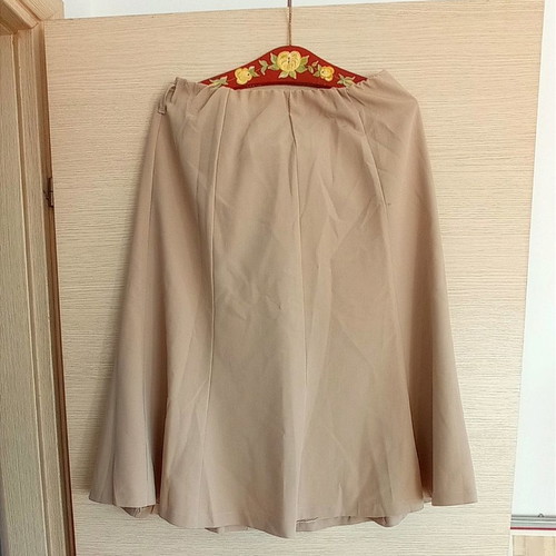 Skirts used, two beige tones, size 52, classic style