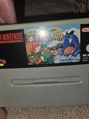 Super Mario World 2: Yoshi's Island cartridge used for Super Nintendo