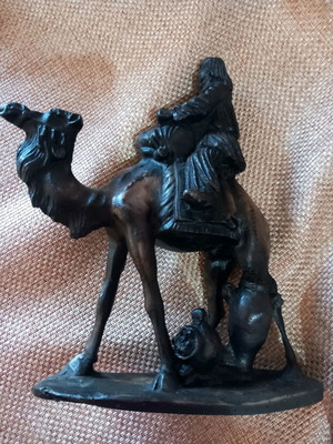 Decorative souvenir Arab man with camel used from Tunisia