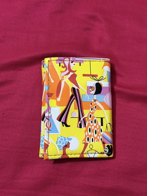 Wallet like new, colorful with design, small size