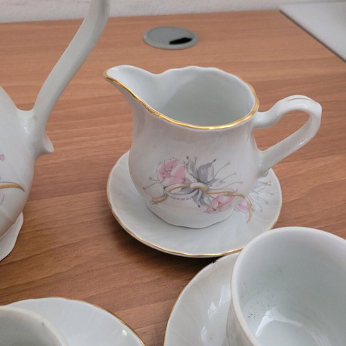 Porcelain tea set used with minor damages