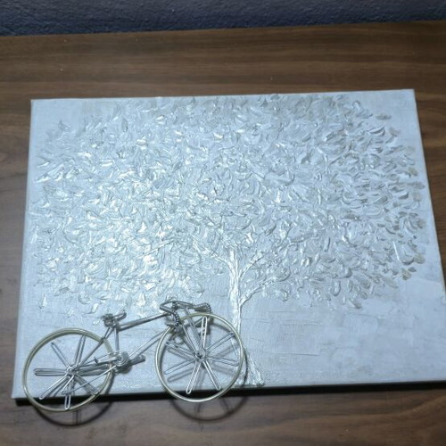 Embossed canvas painting with silver tree and metal bicycle like new