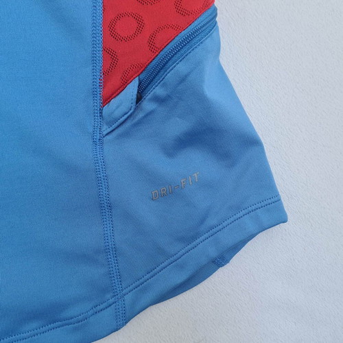 Nike Dri-Fit women's running sports shirt size L with pockets