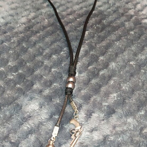 Jewelry pistol and bullet like new, black and silver
