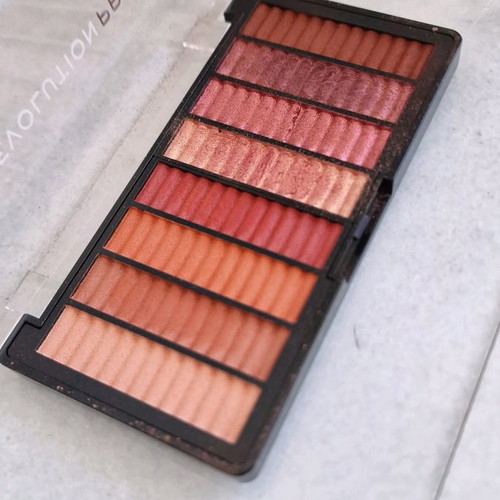 Revolution eyeshadow palette used, warm colors