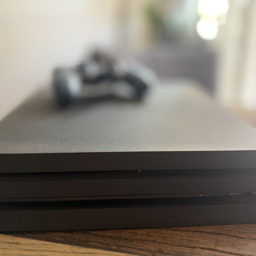 Sony PlayStation 4 Pro console with controller