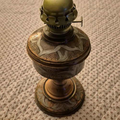 Brass antique oil lamp used with decorative engravings