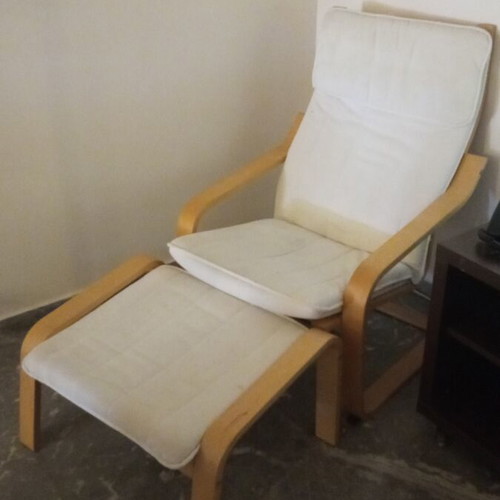 IKEA armchair with footstool used, wooden frame and removable cotton covers