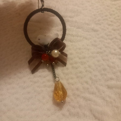 Pendant earring used, bird nest design