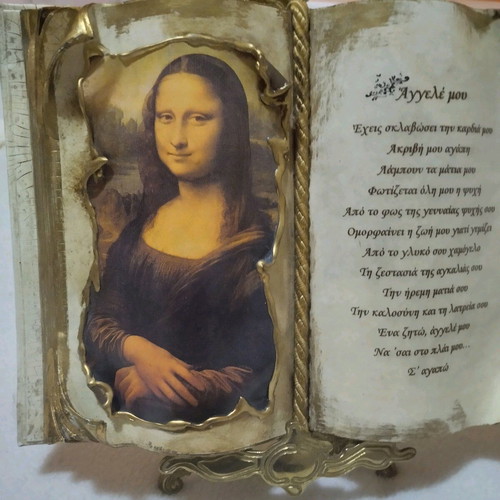 Musical decorative book like new with bronze tripod base
