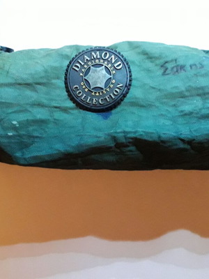 Pencil case used khaki color with ink marks