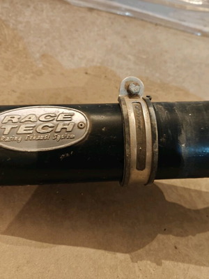 Race Tech exhaust used, no dents, needs painting