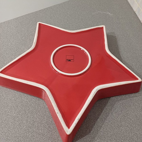 Star-shaped red plate used, 40cm