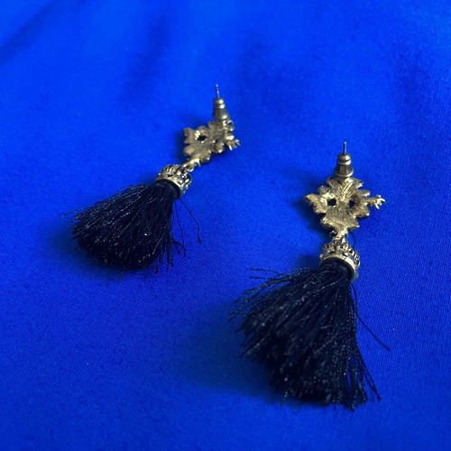 Gold and black earrings with tassel