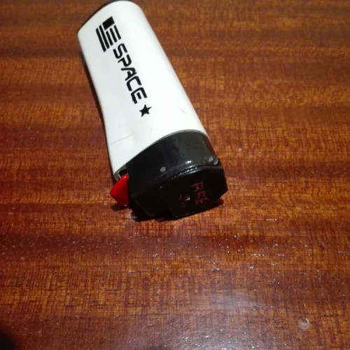 Vintage prank lighter used Greek made Ouzounis 80s