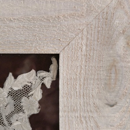 White wooden plank frame new, with vintage lace on velvet base